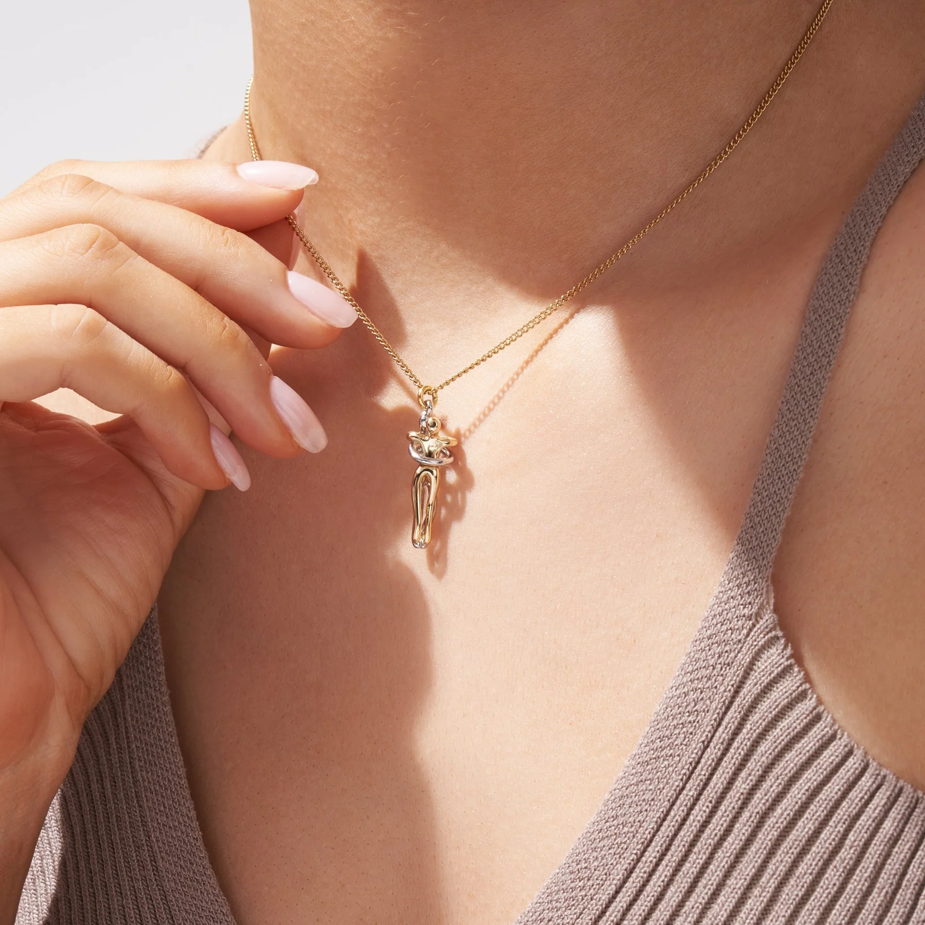 20220524_2742.webp Gold Hug Necklace (With Ring) - Image 4